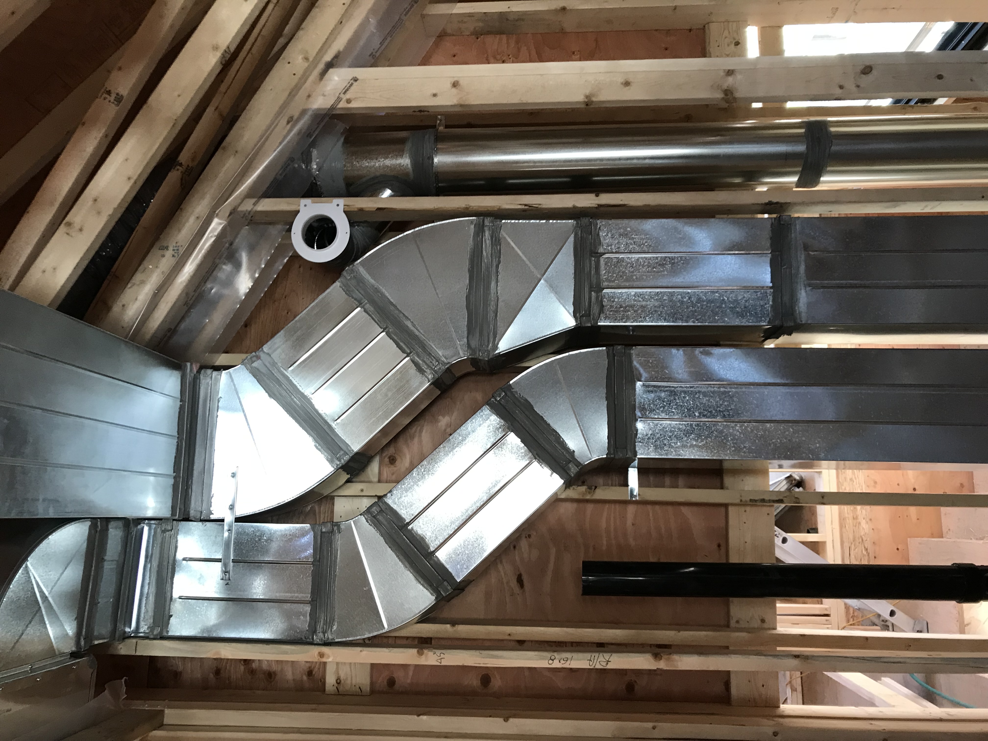 Custom rectangular ductwork in vaulted attic space